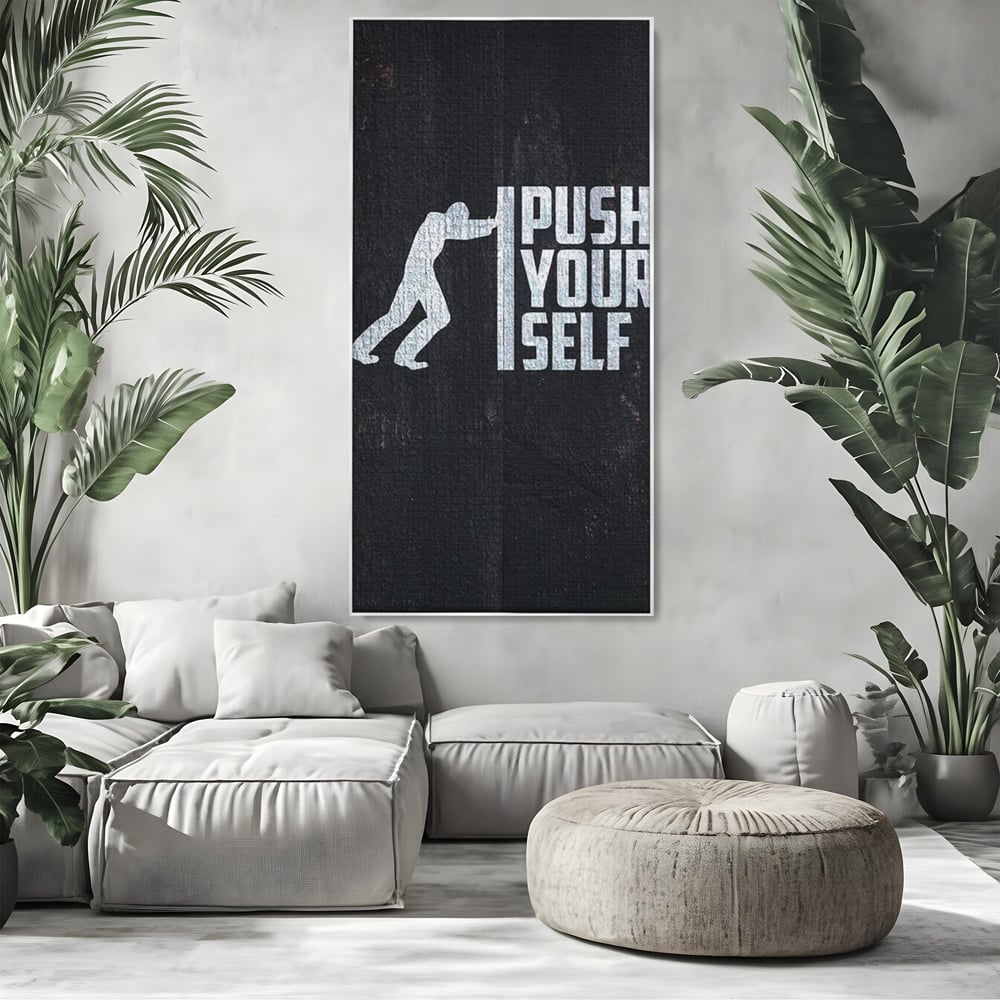 Tablou canvas cu ilustratie motivationala cu silueta care impinge un zid, in rama de aluminiu argintiu, pe perete intr-un living